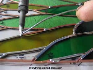 Getting a smooth soldered seam on green stained glass