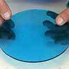 blue circle of glass after circle cutter