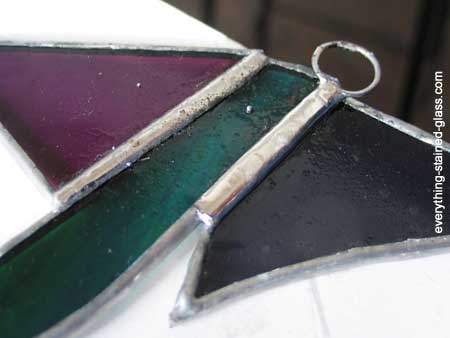 hook soldered to stained glass