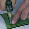 cutting green stained glass