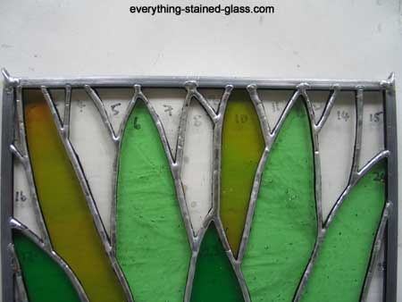 two hooks on stained glass