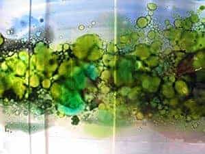green abstract glass painting