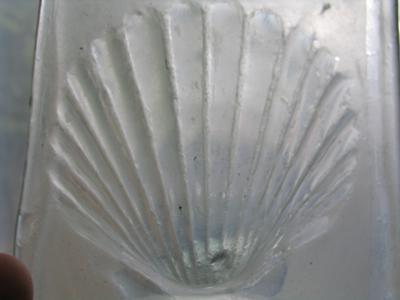 Slumped shell in mould