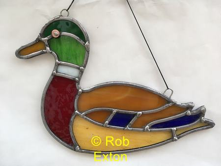 using a washer to make a ducks eye in stained glass