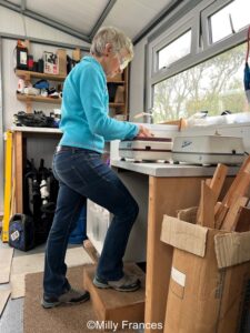 resting alternate feet on a step can help aches and pains when making stained glass