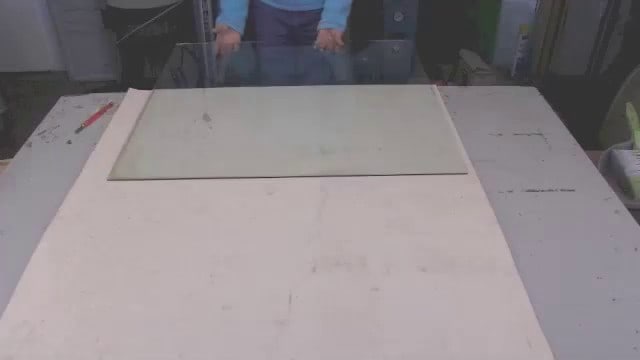 Cutting art glass sheets by banging over bench