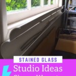 using upvc tubes on the wall to store lead in a stained glass workshop