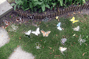 stained glass butterflies in garden