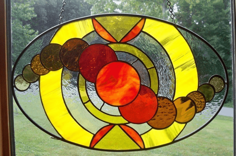 Oval stained glass panel by Lori Jones