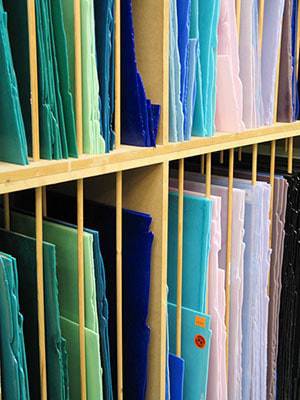 shelves of opal stained glass sheets